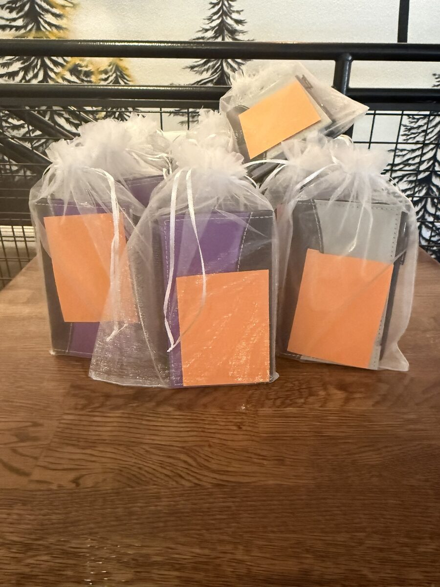 Spiral notebooks prepared for each member