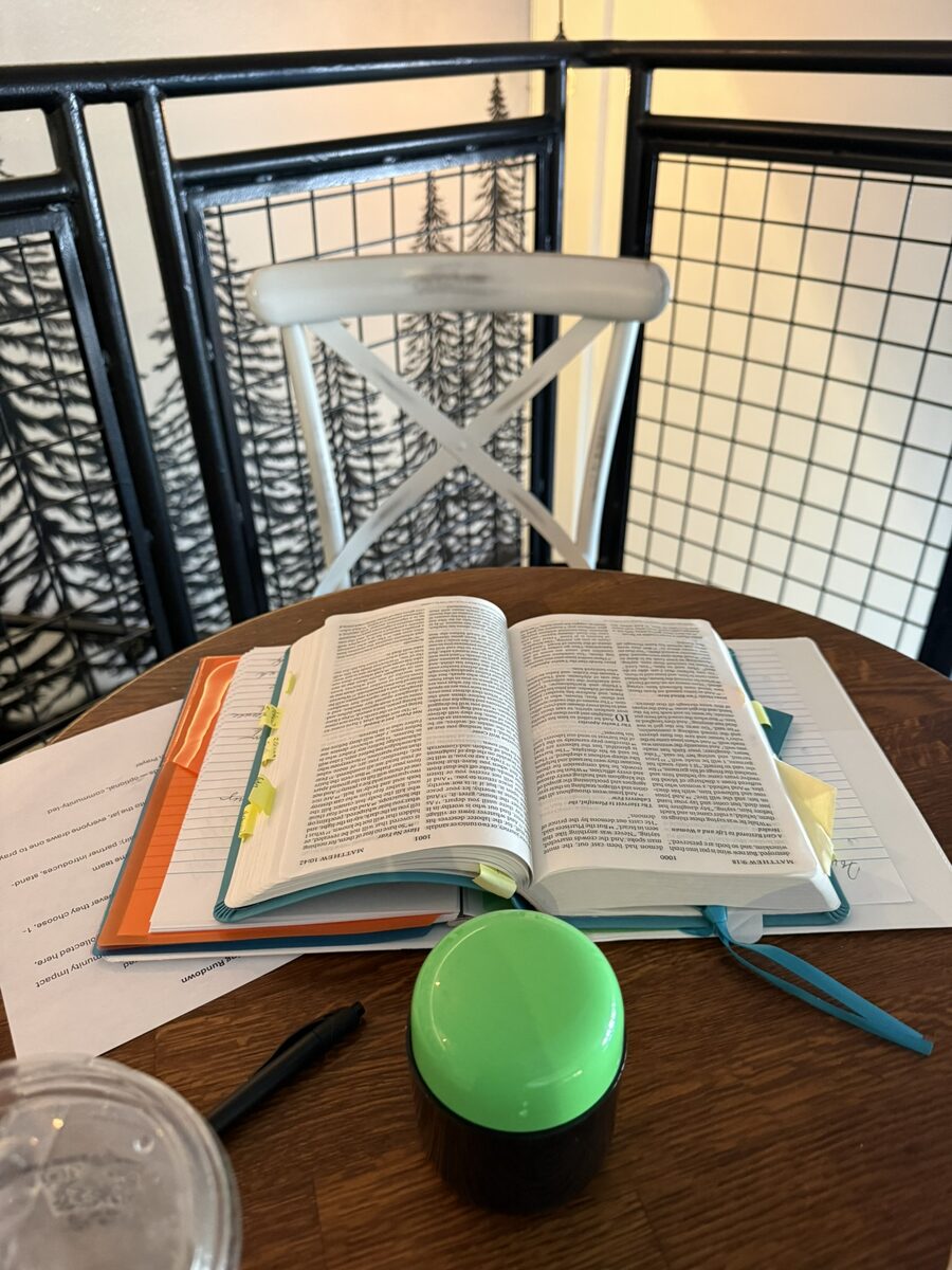 A Bible open on the table during the launch meeting