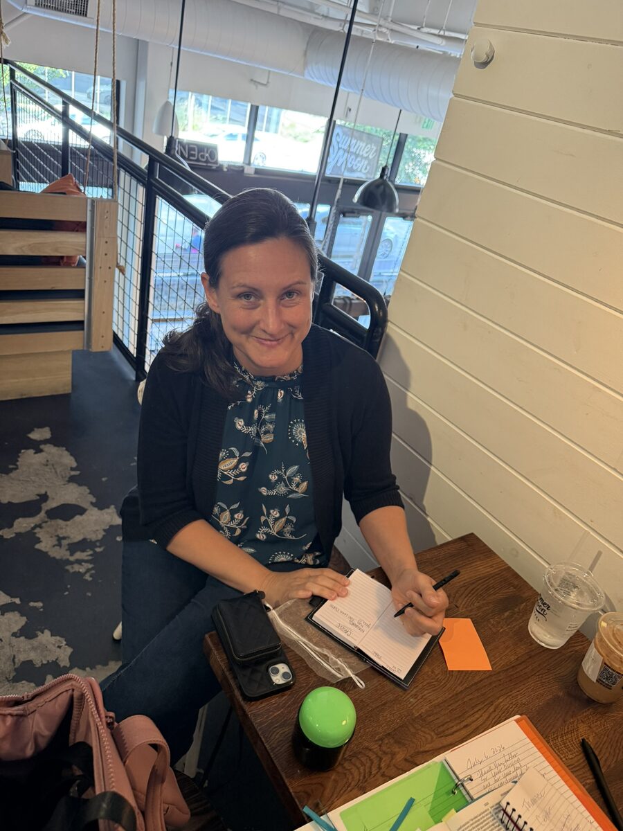 A Change Agent filling out her weekly notebook