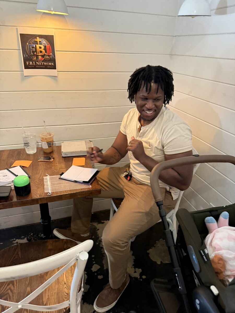 A Change Agent sharing a laugh at the table